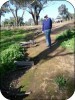 SMULG President, Royce Dickson, shows erosion control measures Notre Dame VCAL students have constructed at Reedy Swamp.