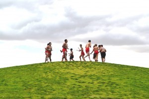 Aboriginal boys dance on the Grassy Knoll, Victoria Park Lake, Shepparton.