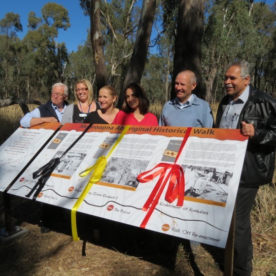 Partners and staff with The Flats Interpretive signage 